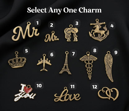 Collection of various charms with different designs on a white background