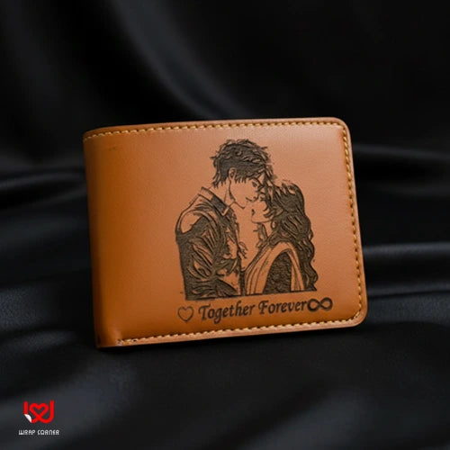 Brown leather wallet with engraved couple illustration and 'Together Forever' text on a black fabric background.